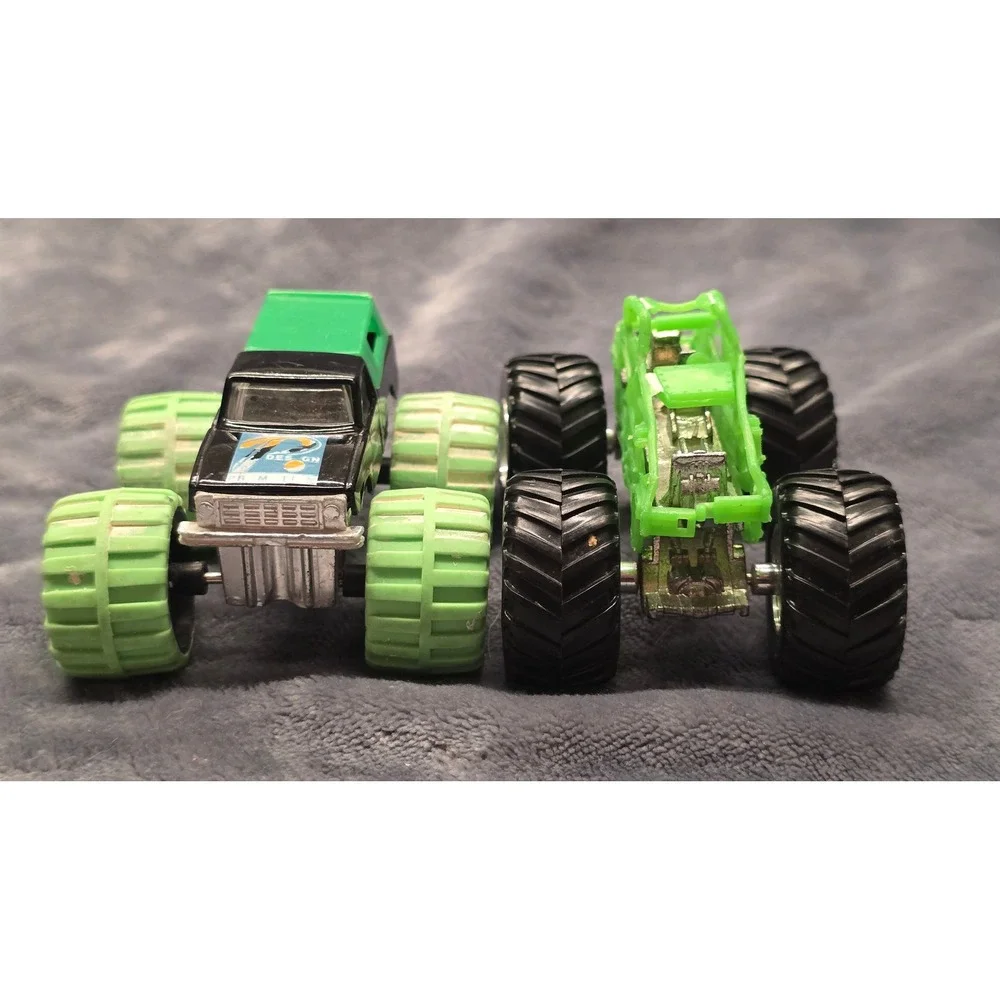 Vintage Diecast Monster Truck Toy Lot Green Black Oversized Tires Set of 2